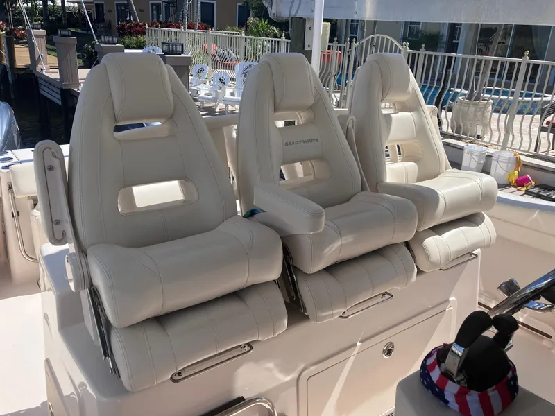 Slide: The Image of 2020 Grady-White Canyon 336 boat seats, luxurious white leather design. - 42