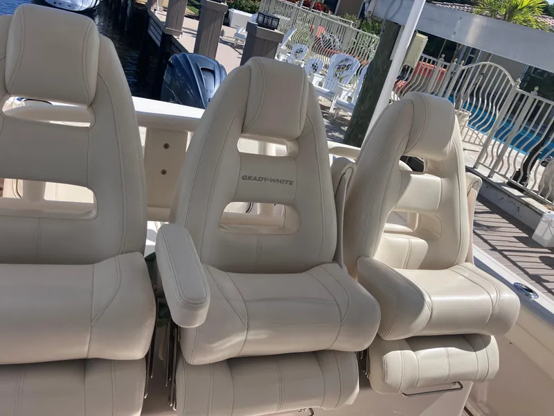 Slide: The Image of Three luxurious seats on a 2020 Grady-White Canyon 336 boat. - 43