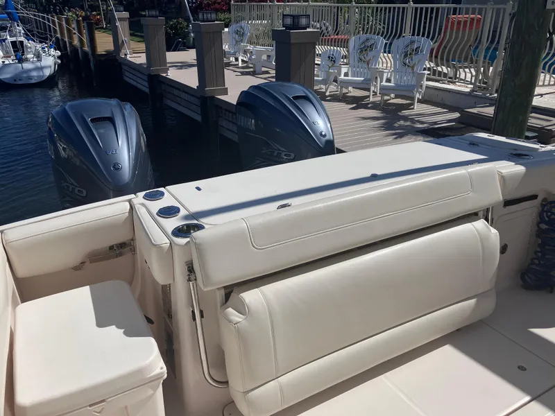 Slide: The Image of 2020 Grady-White Canyon 336 boat with dual Yamaha outboard motors at dock. - 46