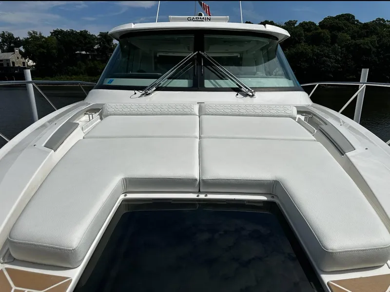 Slide: The Image of 2024 Tiara Yachts 43 LE with spacious deck and luxurious seating. - 16