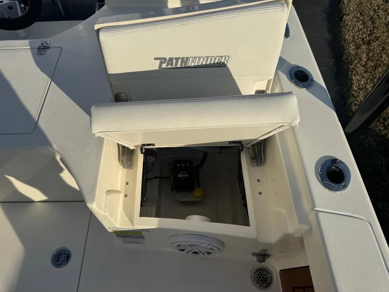 Slide: The Image of 2025 Pathfinder 2500 Hybrid boat seat with storage compartment open. - 32