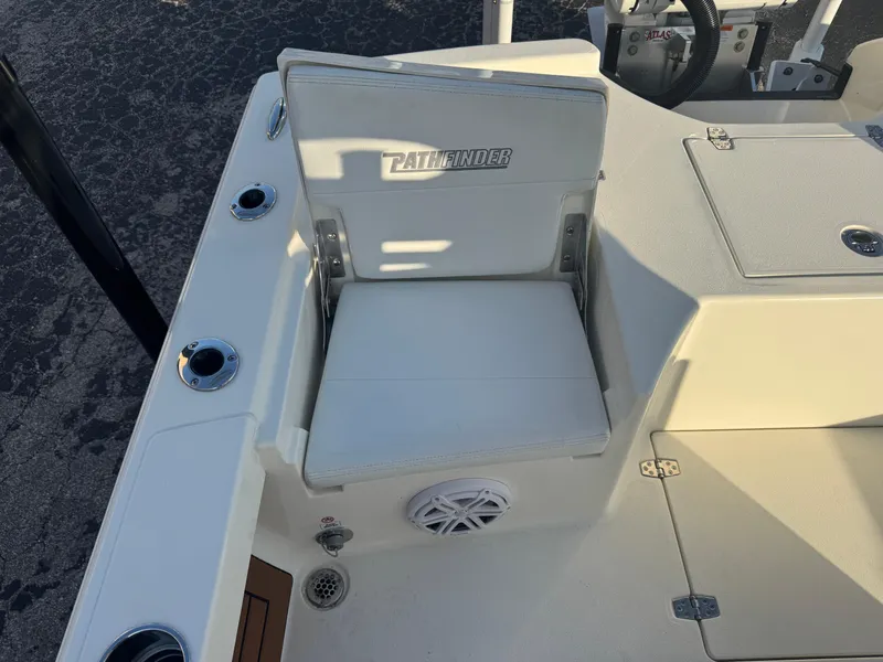 Slide: The Image of 2025 Pathfinder 2500 Hybrid boat seat with cup holders and speaker. - 33