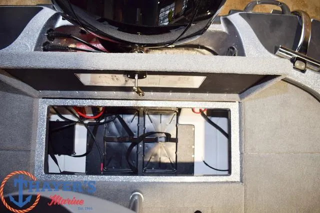 Slide: The Image of Battery compartment of a 2025 Nitro Z18 Pro boat, featuring wiring and storage space. - 17