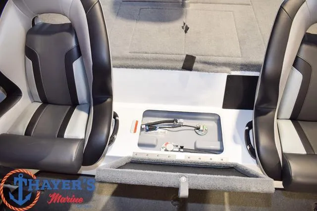Slide: The Image of Two black and gray seats in a 2025 Nitro Z18 Pro boat interior. - 18