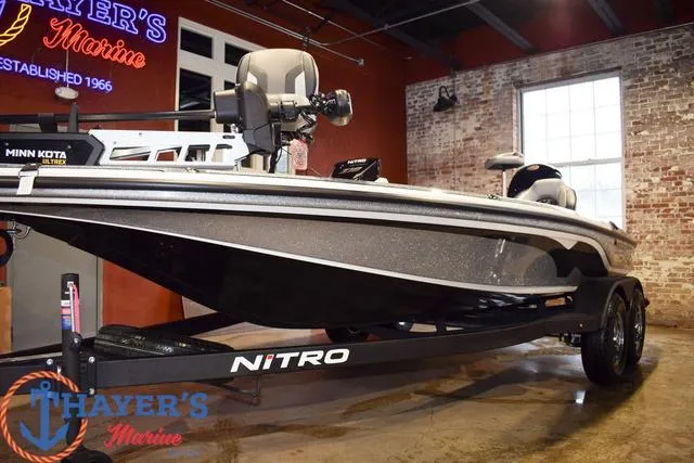 Slide: The Image of 2025 Nitro Z18 Pro boat on display at Thayer's Marine showroom. - 4