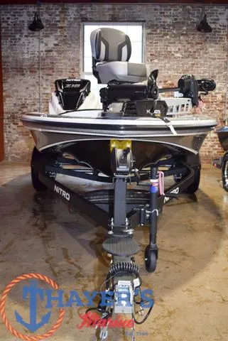 Slide: The Image of 2025 Nitro Z18 Pro boat in showroom, featuring advanced fishing equipment and sleek design. - 7