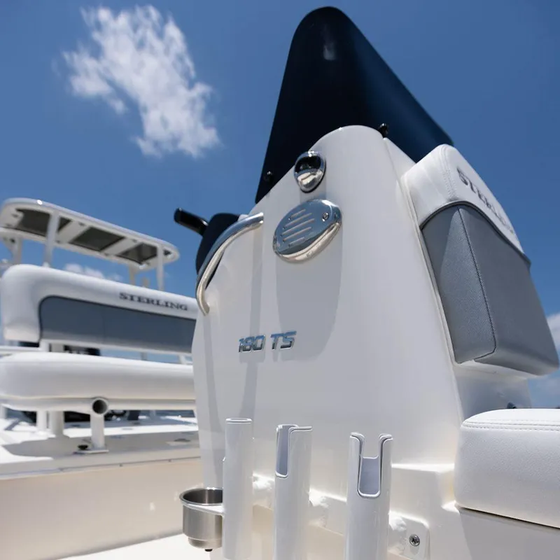 Slide: The Image of 2024 Sterling 180TS boat console under a clear blue sky. - 6
