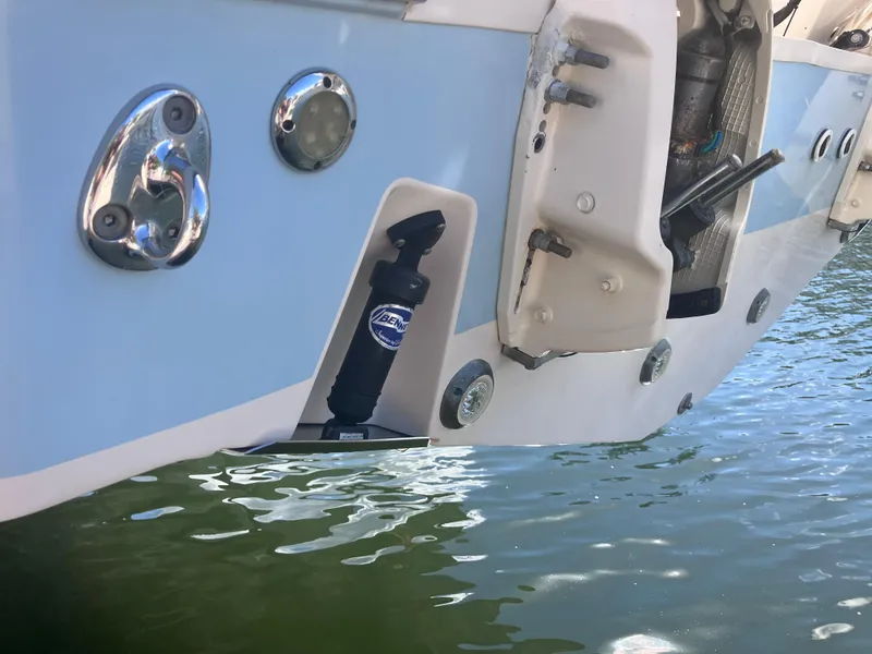 Slide: The Image of 2018 Grady-White Canyon 336 boat stern detail with water reflection. - 11