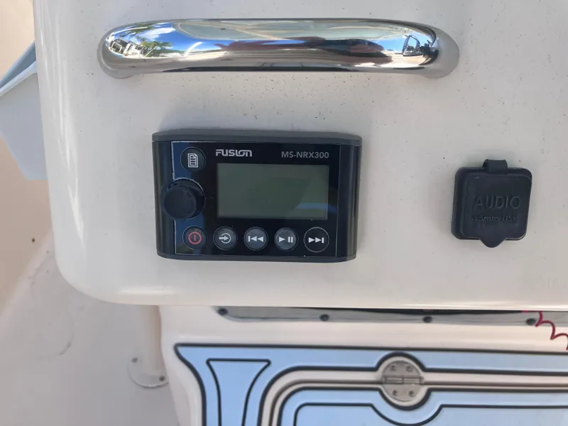 Slide: The Image of Fusion MS-NRX300 audio system on 2018 Grady-White Canyon 336 boat dashboard. - 38