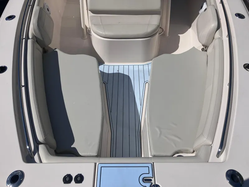 Slide: The Image of 2018 Grady-White Canyon 336 boat interior with cushioned seating and deck. - 45
