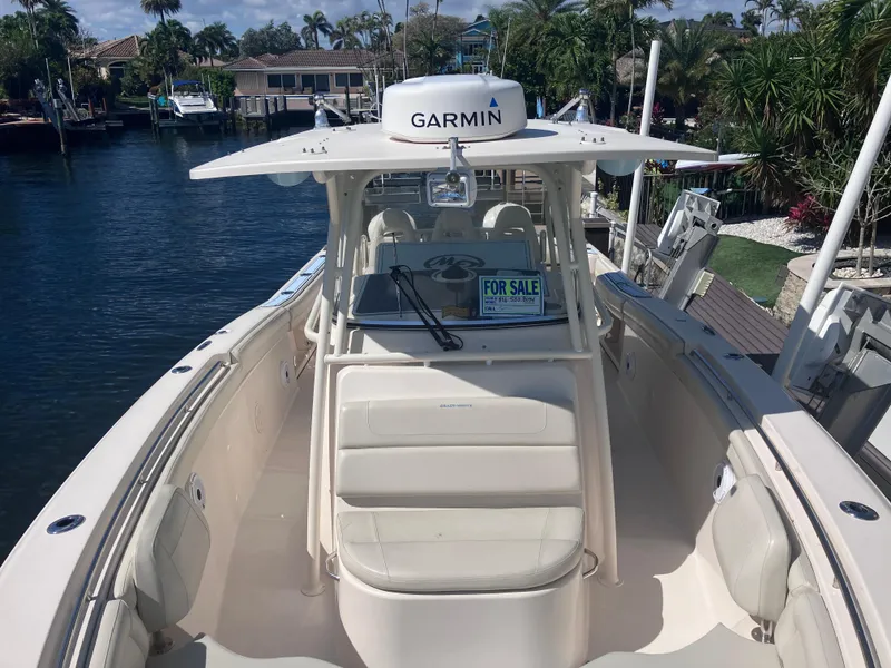 Slide: The Image of 2018 Grady-White Canyon 336 boat with Garmin equipment, for sale at a waterfront location. - 46