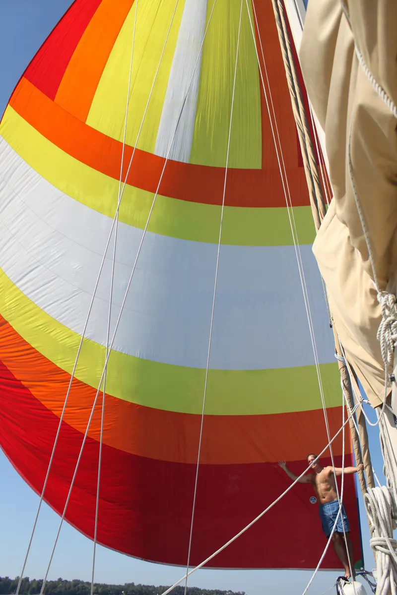 Slide: The Image of Colorful sail on 1983 Whitby 42 Ketch yacht against clear blue sky. - 9
