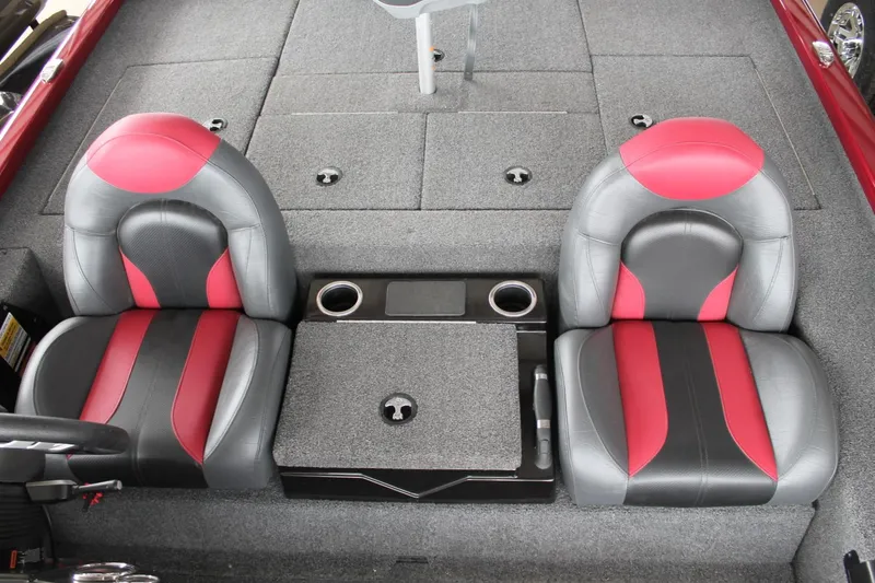 Slide: The Image of 2023 Vexus AVX2080 boat interior with red and gray seats, center console. - 10