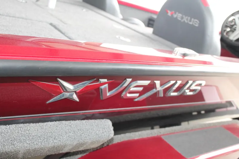 Slide: The Image of 2023 Vexus AVX2080 boat interior with logo, featuring red and gray design. - 19