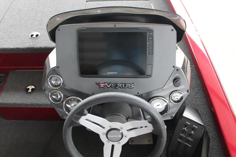 Slide: The Image of 2023 Vexus AVX2080 boat dashboard with Garmin display and steering wheel. - 20