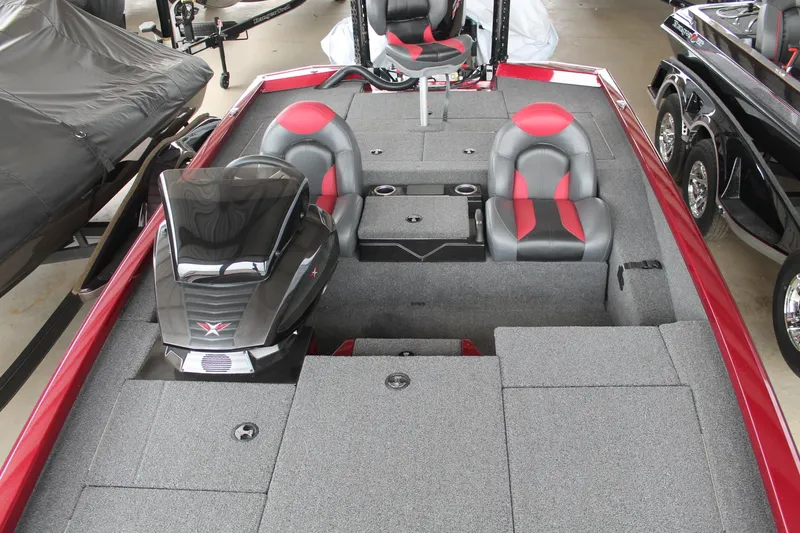 Slide: The Image of 2023 Vexus AVX2080 boat interior with red and gray seating, sleek design. - 22