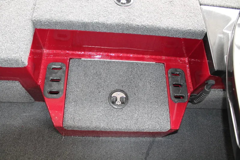 Slide: The Image of 2023 Vexus AVX2080 boat interior with red and gray carpeted storage compartment. - 24