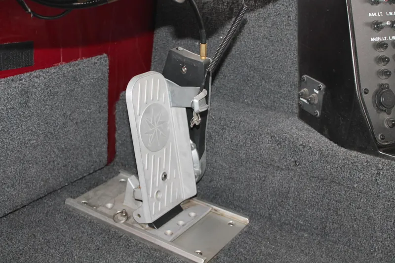 Slide: The Image of 2023 Vexus AVX2080 boat foot pedal and control panel detail. - 4
