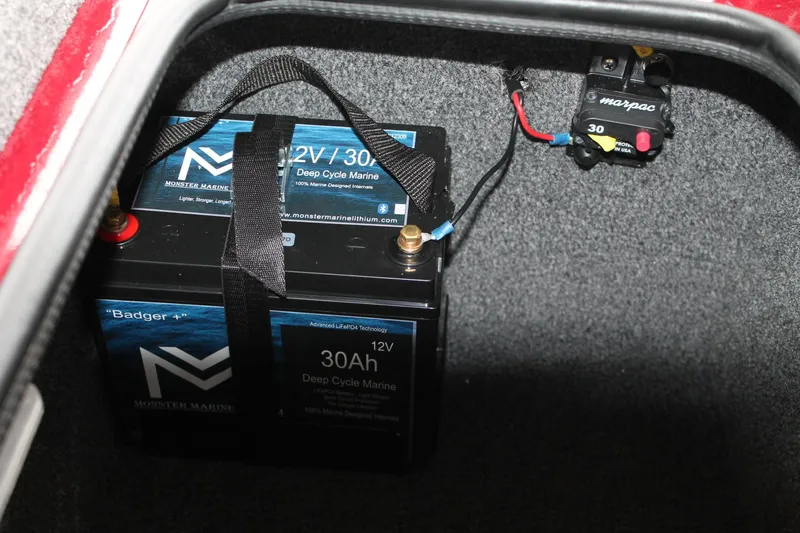 Slide: The Image of 2023 Vexus AVX2080 marine battery compartment with Monster Marine 12V 30Ah deep cycle battery. - 6