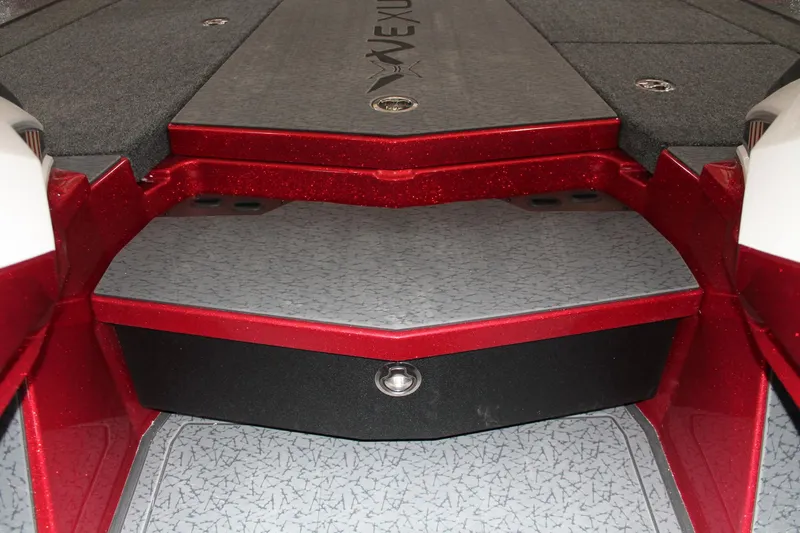 Slide: The Image of 2025 Vexus VXS21 boat interior with red accents and textured flooring. - 15