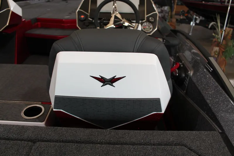 Slide: The Image of 2025 Vexus VXS21 boat interior with sleek black and white seating and modern dashboard. - 22