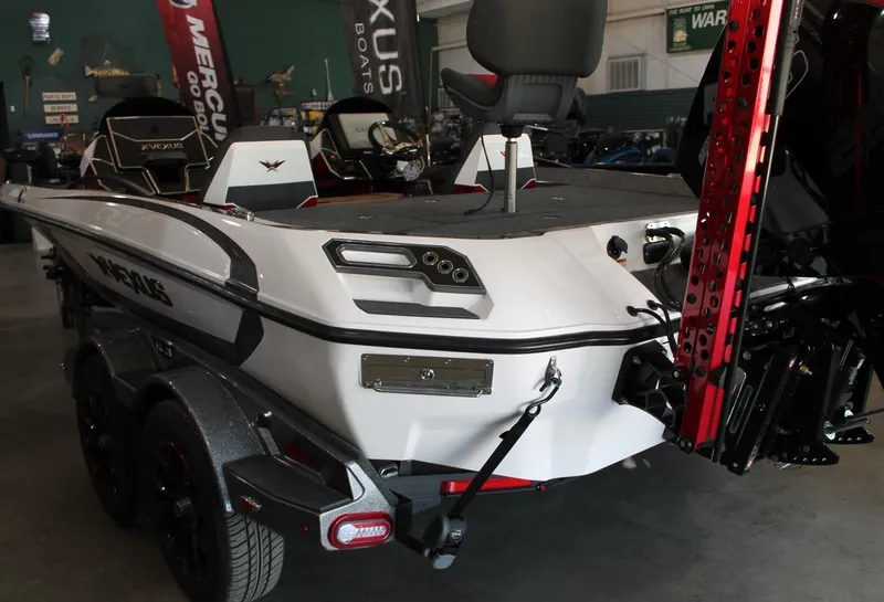 Slide: The Image of 2025 Vexus VXS21 boat in showroom, showcasing sleek design and advanced features. - 25