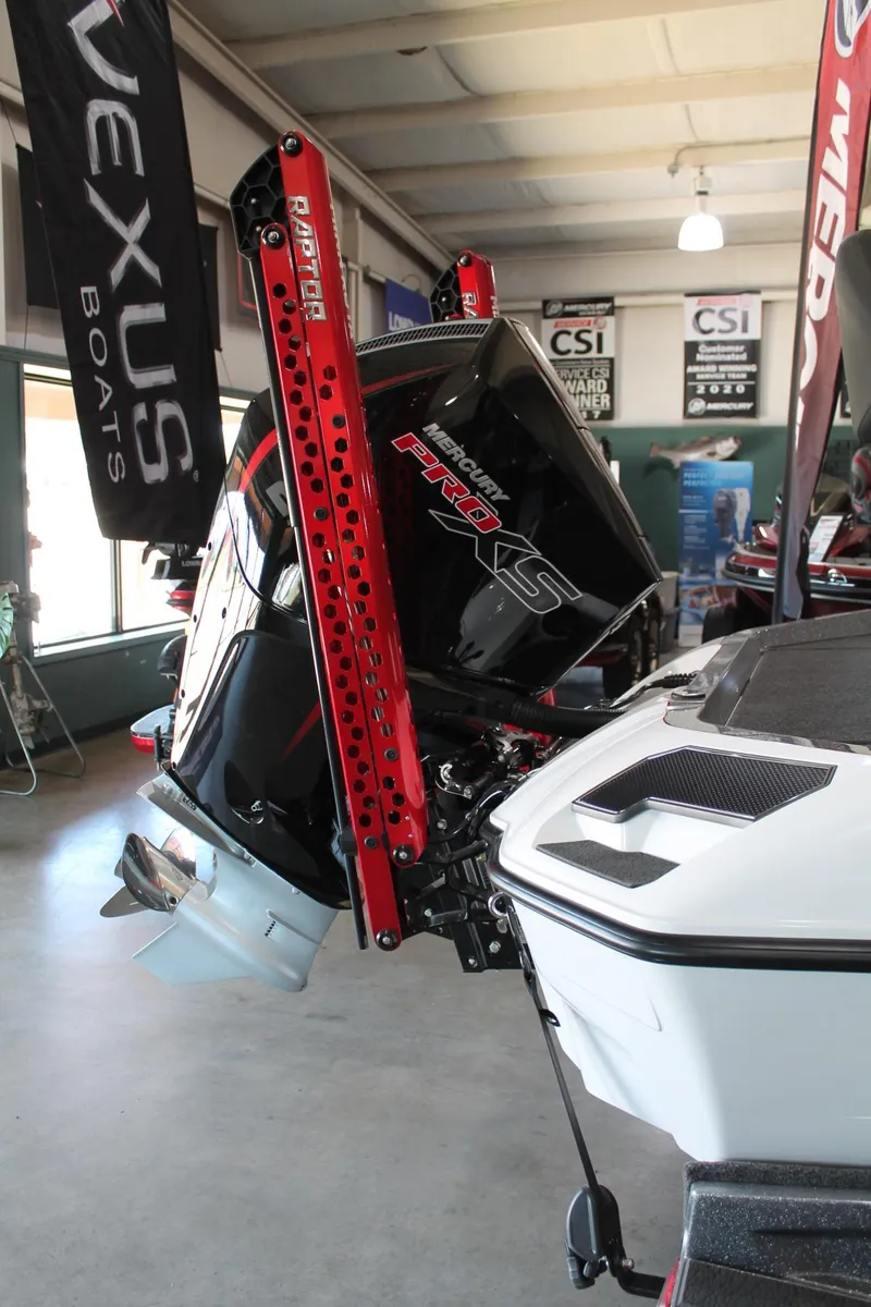 Slide: The Image of 2025 Vexus VXS21 boat with Mercury Pro XS engine in showroom. - 27
