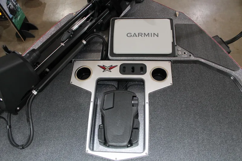 Slide: The Image of 2025 Vexus VXS21 boat dashboard with Garmin display and foot pedal controls. - 30