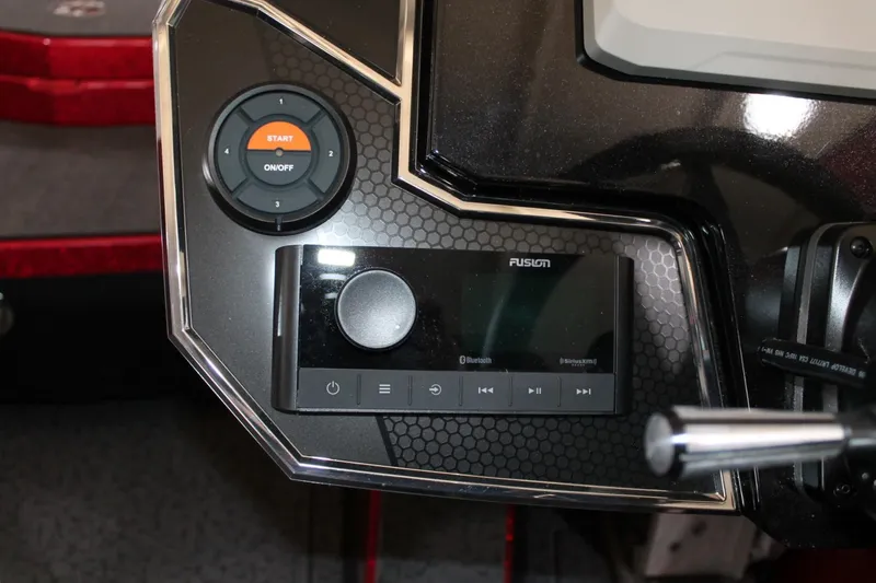 Slide: The Image of Control panel of 2025 Vexus VXS21 boat with Fusion audio system and start button. - 35