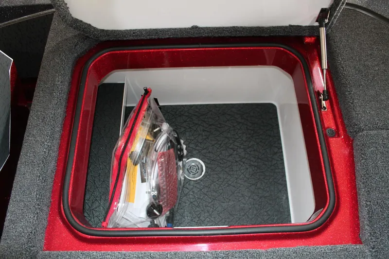 Slide: The Image of Storage compartment of 2025 Vexus VXS21 boat with organized gear inside. - 38