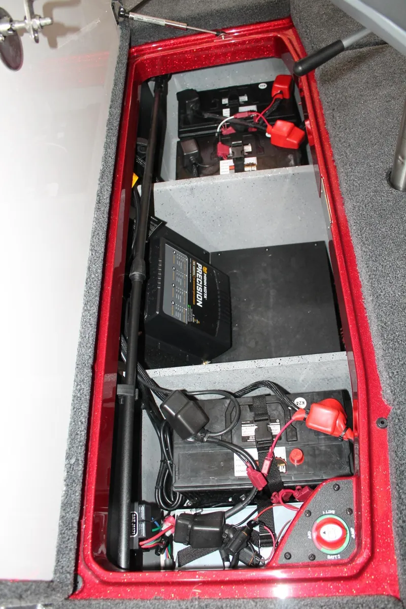 Slide: The Image of Battery compartment of 2025 Vexus VXS21 boat with precision charger and wiring. - 40
