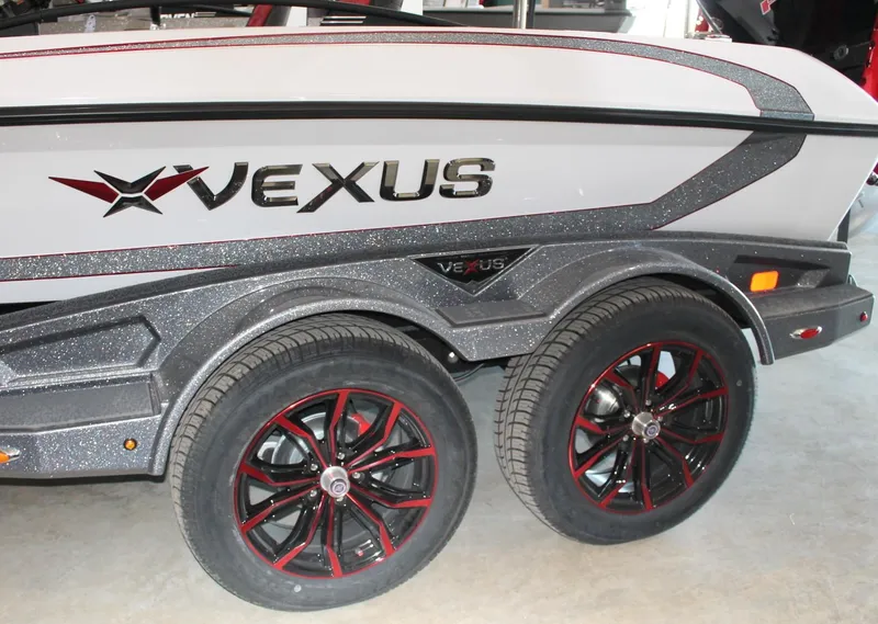 Slide: The Image of 2025 Vexus VXS21 boat trailer with stylish wheels and sleek design. - 5