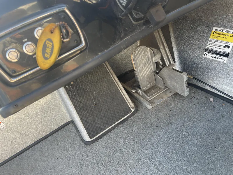 Slide: The Image of Foot pedal and control panel in 2017 Nitro Z19 boat cockpit. - 11