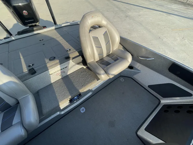 Slide: The Image of 2017 Nitro Z19 boat interior with gray seating and OptiMax engine. - 12