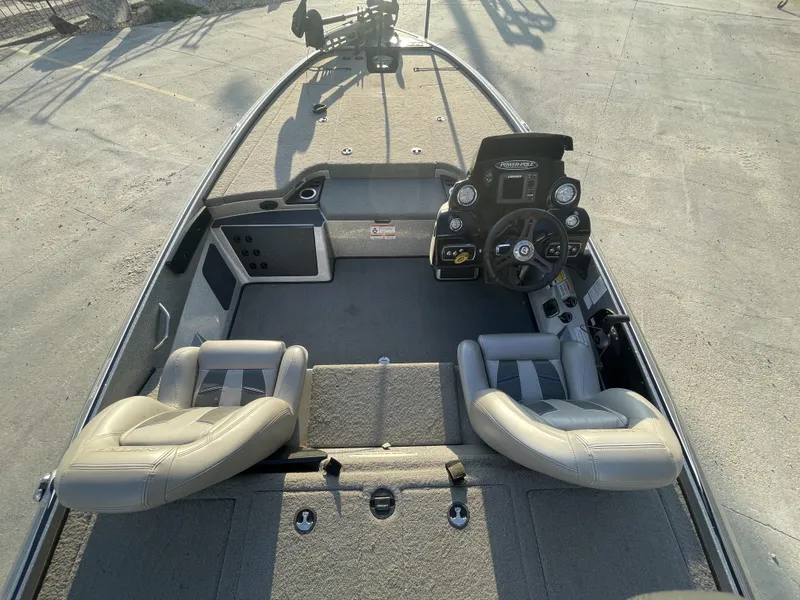 Slide: The Image of 2017 Nitro Z19 boat interior with dual seats and steering console. - 4