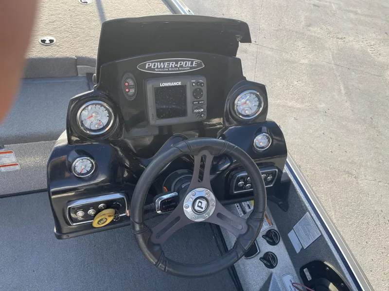 Slide: The Image of Dashboard of a 2017 Nitro Z19 boat with steering wheel and gauges. - 6