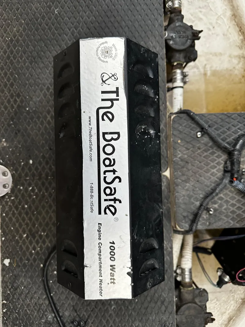 Slide: The Image of The BoatSafe engine compartment heater in a 2003 Chaparral 330 Signature Cruiser. - 11