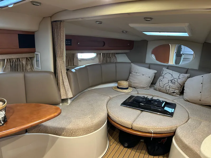 Slide: The Image of Interior of 2003 Chaparral 330 Signature Cruiser with cozy seating and elegant decor. - 20