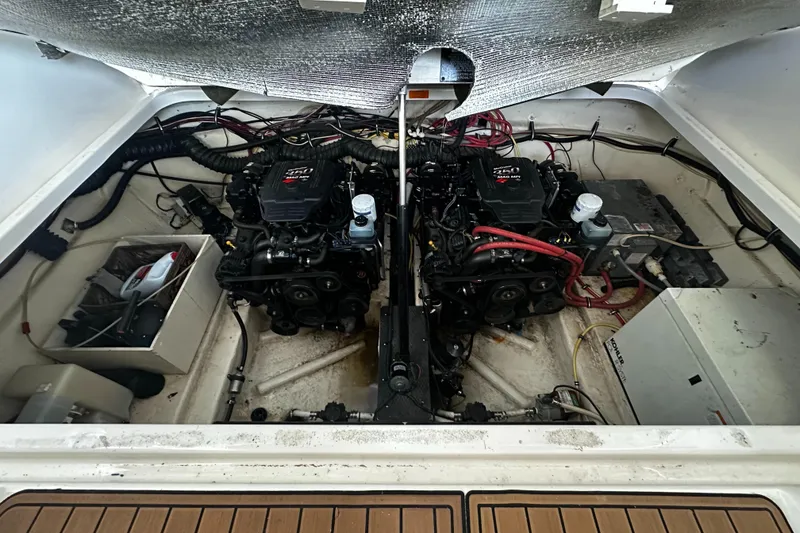 Slide: The Image of Engine compartment of a 2003 Chaparral 330 Signature Cruiser with dual engines. - 25