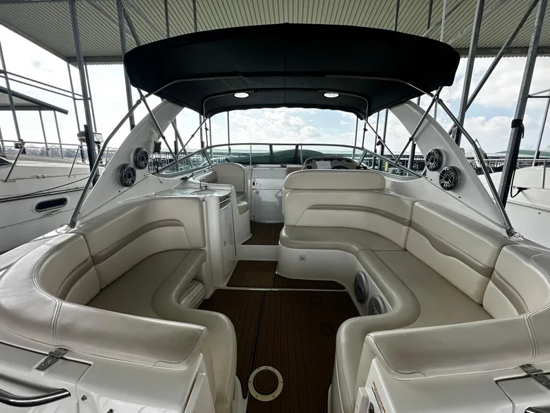Slide: The Image of 2003 Chaparral 330 Signature Cruiser interior with spacious seating and modern amenities. - 3
