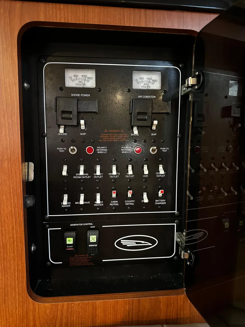 Slide: The Image of Electrical control panel in a 2003 Chaparral 330 Signature Cruiser. - 9