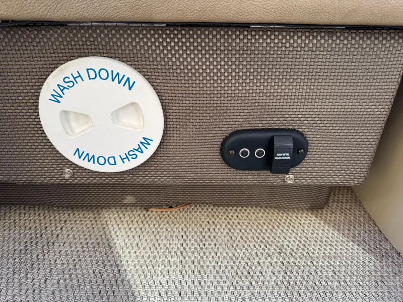 Slide: The Image of Wash down control panel on 2019 Godfrey Premium 235SD Sundeck boat. - 15