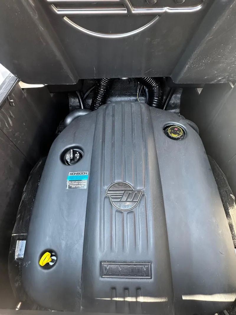 Slide: The Image of 2024 Malibu 22 LSV engine compartment with Monsoon engine cover. - 18