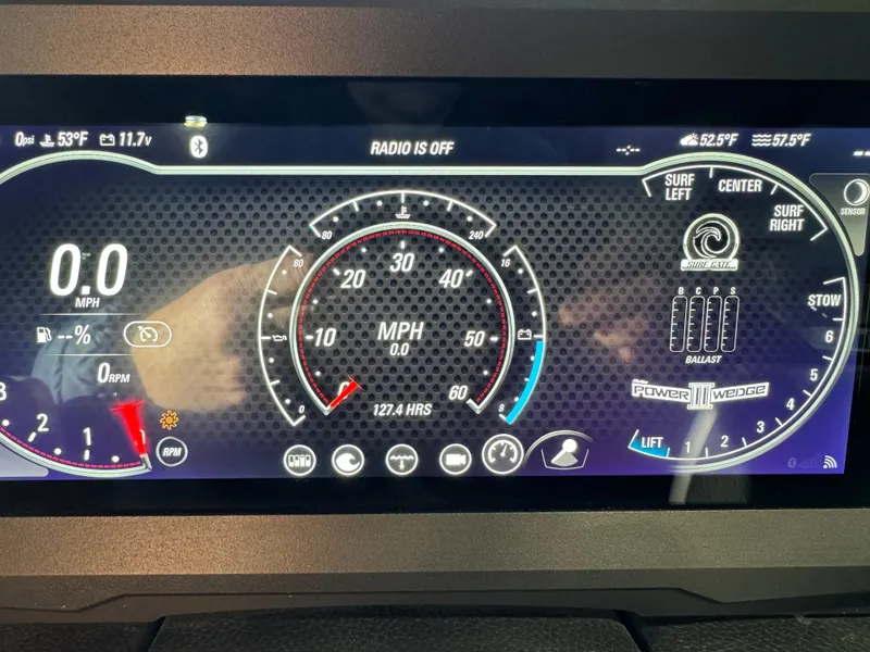 Slide: The Image of 2024 Malibu 22 LSV dashboard display showing speedometer and control settings. - 10