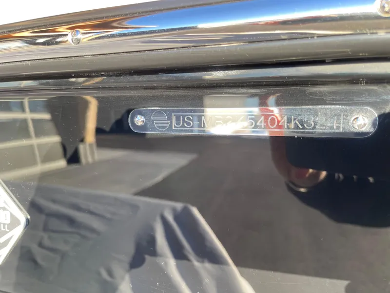 Slide: The Image of 2024 Malibu 22 LSV boat identification number plate close-up. - 12