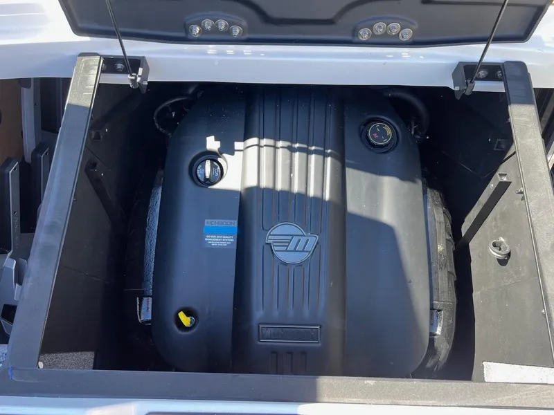 Slide: The Image of 2024 Malibu 23 LSV engine compartment, showcasing a powerful inboard motor. - 20
