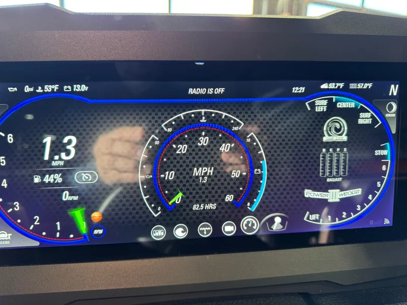 Slide: The Image of Dashboard display of 2024 Malibu 24 MXZ boat showing speed, RPM, and ballast settings. - 18