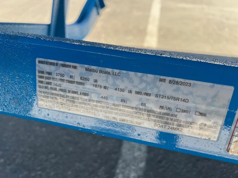 Slide: The Image of Label on 2024 Malibu 24 MXZ boat trailer, manufactured by Malibu Boats, LLC. - 23