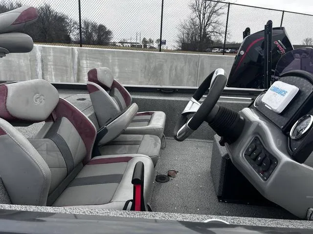 Slide: The Image of 2022 G3 Sportsman 1910 boat interior with steering wheel and seating. - 3
