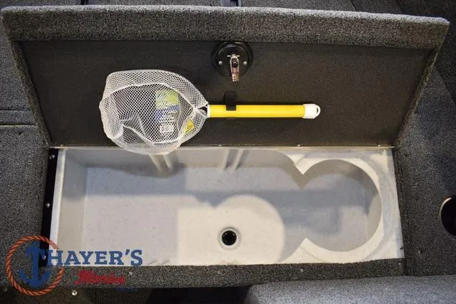 Slide: The Image of 2025 Lund 1650 Rebel XL SS boat storage compartment with fishing net. - 15